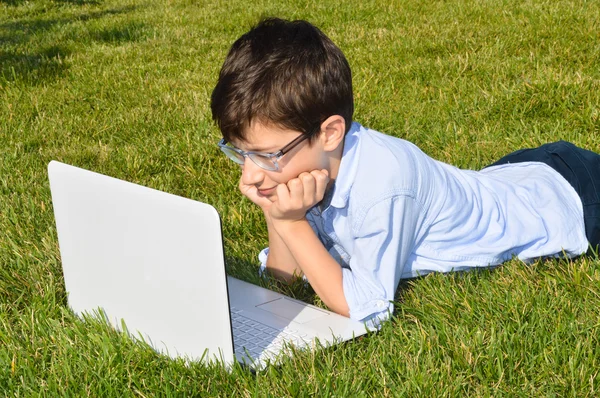 Child using laptop Stock Picture