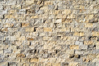 Dikdörtgen kesim bej mermer duvar dokusu arka plan olabilir, fayanssız dizilmiş