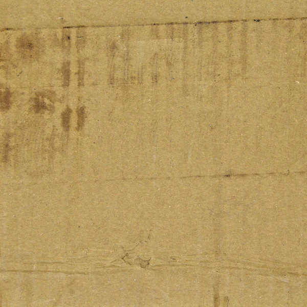 褐色和米黄色波纹纸板的细节 隔离在黑色背景 — 图库照片