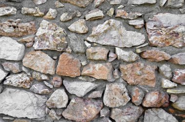 Sağlam sarı ve bej kesimli taş duvar, arka planlar için iyi, düzgün sıralanmış.