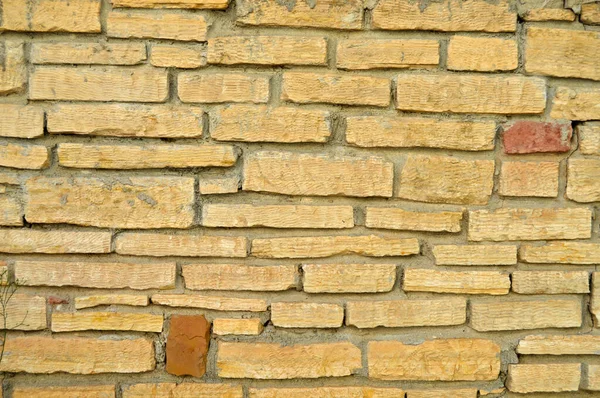 Parede Pedra Cortada Amarelo Bege Resistente Boa Para Fundos Sem — Fotografia de Stock