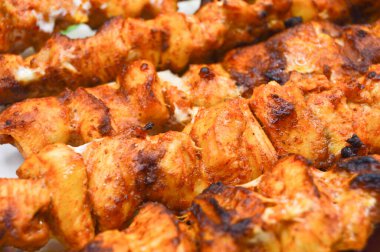 A magnificent dining table and chicken shish kebab in a luxury restaurant, delicious tavuk sis kebab