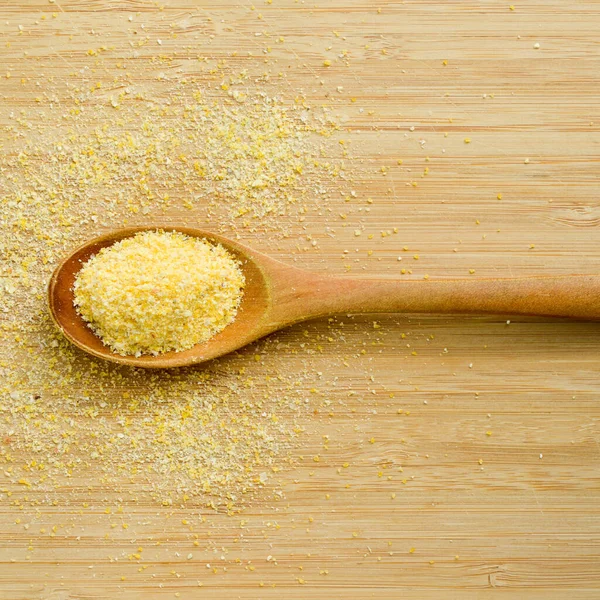 Uncooked Yellow Corn Flour Wooden Spoon Bamboo Cutting Board — Stock Photo, Image