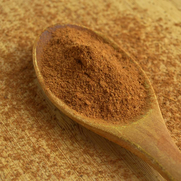 Delicious Aromatic Spices Powdered Cinnamon Wooden Spoon Wooden Background — Stock Photo, Image