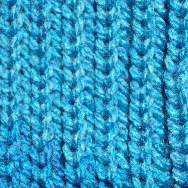 Yünden desenli kumaş. El yapımı kumaş mavi yün arkaplan dokusu