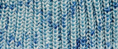 Yünden desenli kumaş. El yapımı kumaş mavi yün arkaplan dokusu