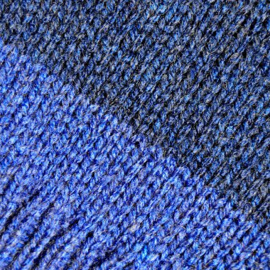 Yünden desenli kumaş. El yapımı kumaş mavi yün arkaplan dokusu