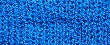 Yünden desenli kumaş. El yapımı kumaş mavi yün arkaplan dokusu