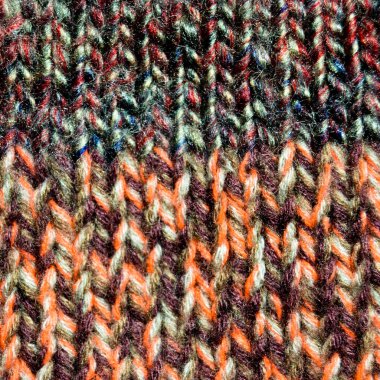 Yünden desenli kumaş. El yapımı kumaş rengi yün arkaplan dokusu