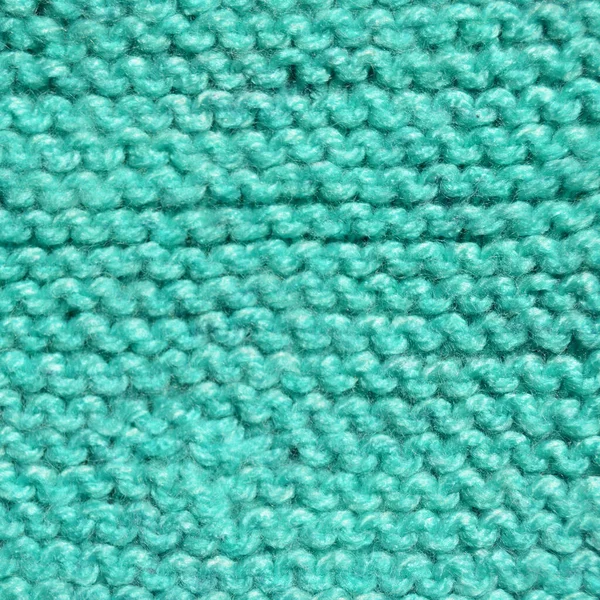 用羊毛制成的花纹织物 手工针织物绿松石羊毛背景质感 — 图库照片