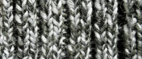 用羊毛制成的花纹织物 手工针织物灰羊毛背景质感 — 图库照片