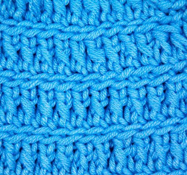 Yünden desenli kumaş. El yapımı kumaş mavi yün arkaplan dokusu