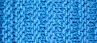 Yünden desenli kumaş. El yapımı kumaş mavi yün arkaplan dokusu