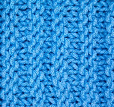 Yünden desenli kumaş. El yapımı kumaş mavi yün arkaplan dokusu