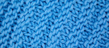 Yünden desenli kumaş. El yapımı kumaş mavi yün arkaplan dokusu