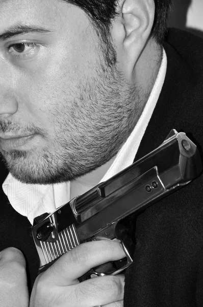 Houden van een handpistool — Stockfoto