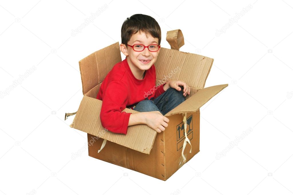 Happy young children in box