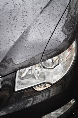 Head lamp of black car