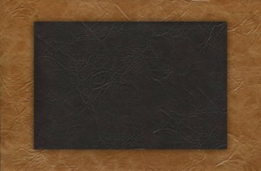 Taklit sığır derisi bej ve siyah doku. Yakın plan, herhangi bir tasarım çalışması için kullanışlı.