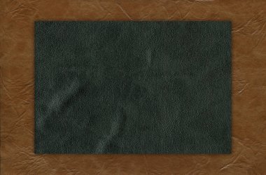 Taklit sığır derisi bej ve siyah doku. Yakın plan, herhangi bir tasarım çalışması için kullanışlı.