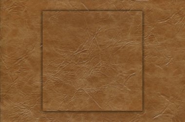 Taklit sığır derisi bej ve kahverengi desen yakın plan, herhangi bir tasarım çalışması için kullanışlı arka plan