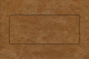 Taklit sığır derisi bej ve kahverengi desen yakın plan, herhangi bir tasarım çalışması için kullanışlı arka plan