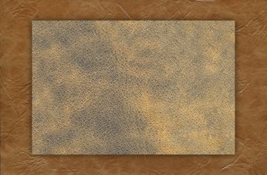 Taklit sığır derisi bej ve kahverengi desen yakın plan, herhangi bir tasarım çalışması için kullanışlı arka plan