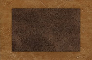 Taklit sığır derisi bej ve kahverengi desen yakın plan, herhangi bir tasarım çalışması için kullanışlı arka plan