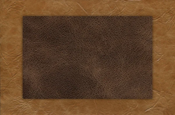 Taklit sığır derisi bej ve kahverengi desen yakın plan, herhangi bir tasarım çalışması için kullanışlı arka plan