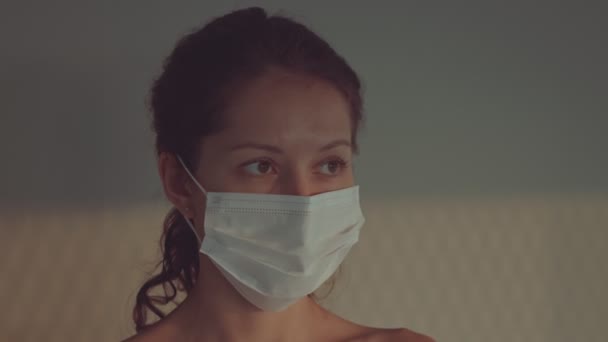 Portrait of a Young Woman Wearing Protective Medical Face Mask — Stock Video