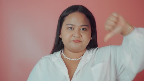 Portrait of an Asian plus size Woman with Thumbs down — Stock Video