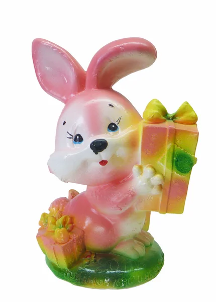 Bright porcelain hare with gift — Stock Photo, Image