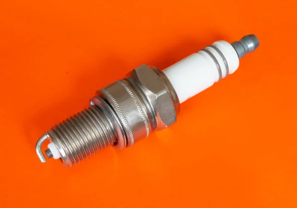 Car Spark Plug Orange Background Electric Device Machine Space Design — Stock Photo, Image