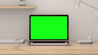 Krom Anahtar için Yeşil Ekran 'ı olan dizüstü bilgisayar. Çalışma Masasındaki Mock Up 'a, Kromakey için Yeşil Ekran' la Beyaz Oda Arkaplanı 'na yakınlaş. İş Nesnesinin Yatay Sunumu