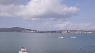 Ayvalik ve Cunda Adası Panorama, kürek, tekne, güneş, deniz ve bulutlar zaman atlaması