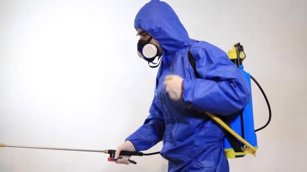 Pest control protective equipment, ready to disinfect on white background. — Stock Video