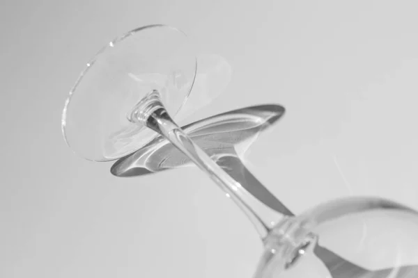 A part of wine glass lies on white background. — Stockfoto