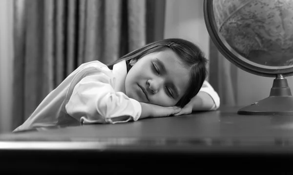 Black and white portrait of girl fell asleep while doing homewor — Stock Photo, Image