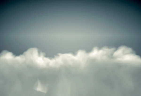 Vue de dessus sur des nuages pelucheux éclairés par le soleil. rendu 3d réaliste — Photo