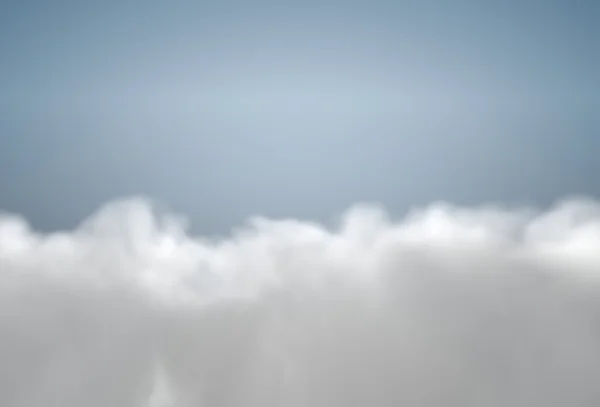 View from the airplane on blue sky covered with fluffy clouds — Stock Photo, Image