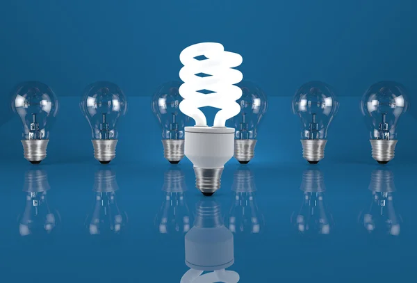 Concept of energy saving. Eco light bulb in row of incandescent — Stock Photo, Image