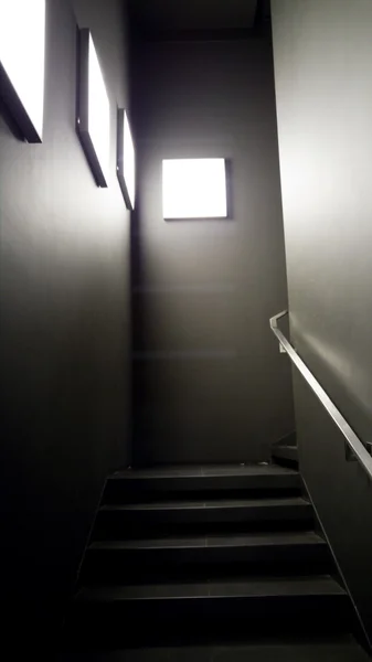 Stairs in modern building illuminated by light panels — Stock Photo, Image