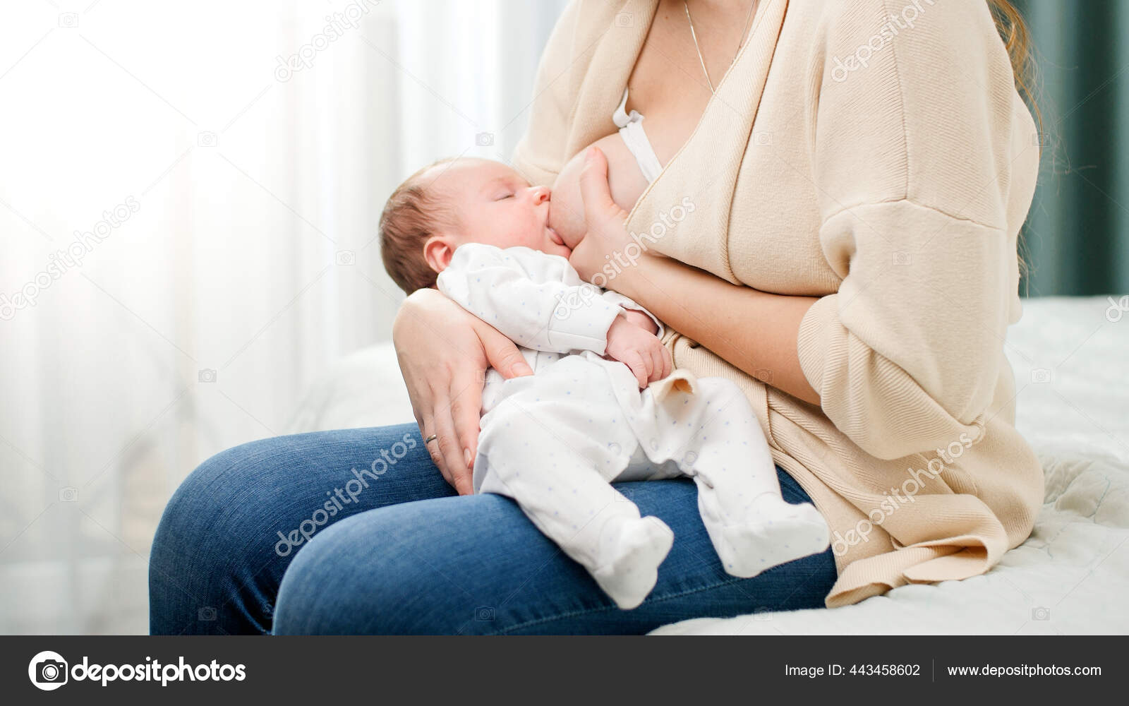 Cute little baby boy lying on mothers hands and sucking breast milk.  Concept of healthy and natural baby breastfeeding nutrition. Stock Photo by  ©Kryzhov 443458602