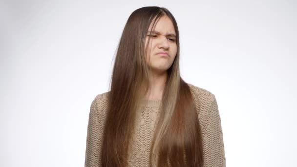 Studio portrait of displeased girl shaking head and saying no. Denial sign — Stock Video