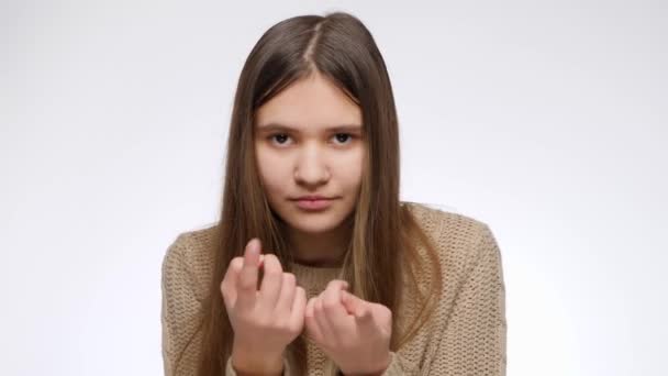 Portrait of young girl beckoning, attracting or calling you with fingers — Stock Video