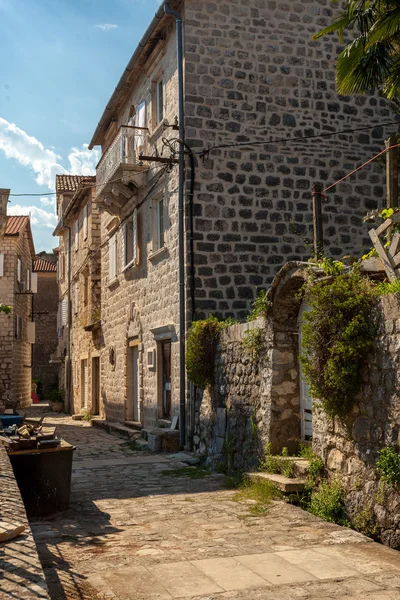 Narrow street of ancient city Perast, Montenegro — Stock Photo, Image