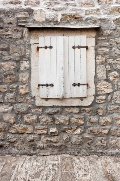 White window shutters at old building — Stock Photo, Image