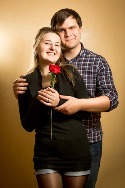 Portrait of embracing happy young couple — Stock Photo, Image