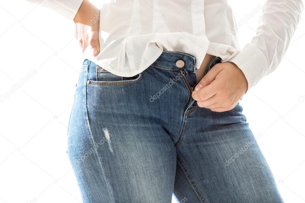 Slim Woman In White Shirt Unbuttoning Blue Jeans Stock Photo By C Kryzhov