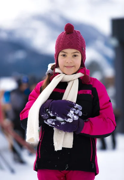 Portrait of cute smiling woman posing against high Alps — Stock Photo, Image